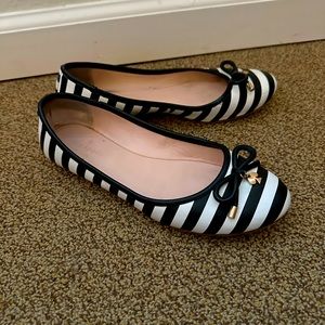 Kate spade flats size 8. Black and white stripes. Used but in great condition.